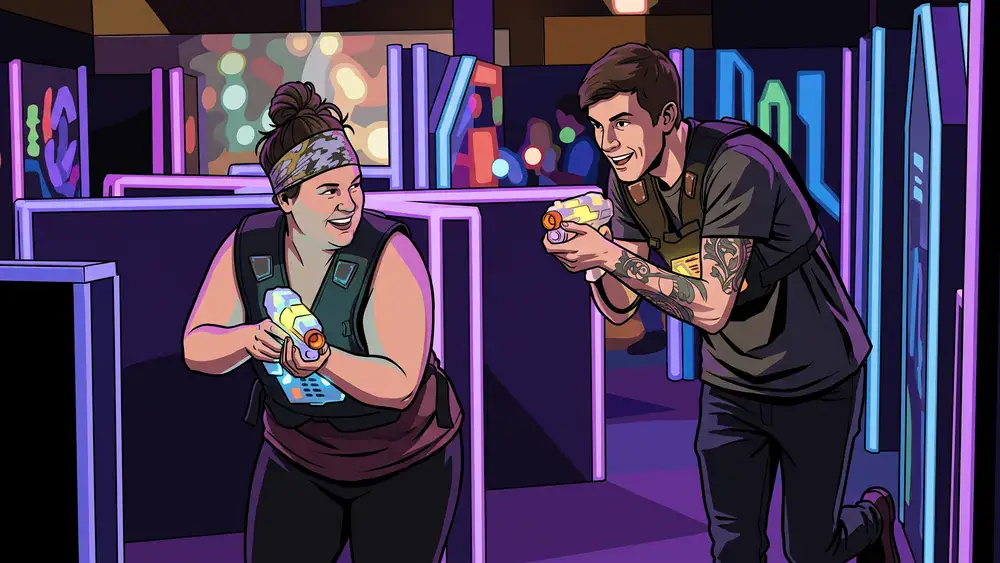 LaserZone Bielefeld – Zwei Personen spielen Lasertag in einer dunklen Neon-Arena