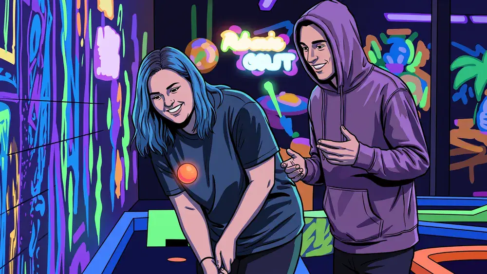 Schwarzlicht Minigolf in Düsseldorf – Team spielt Minigolf in leuchtender 3D-Neonwelt