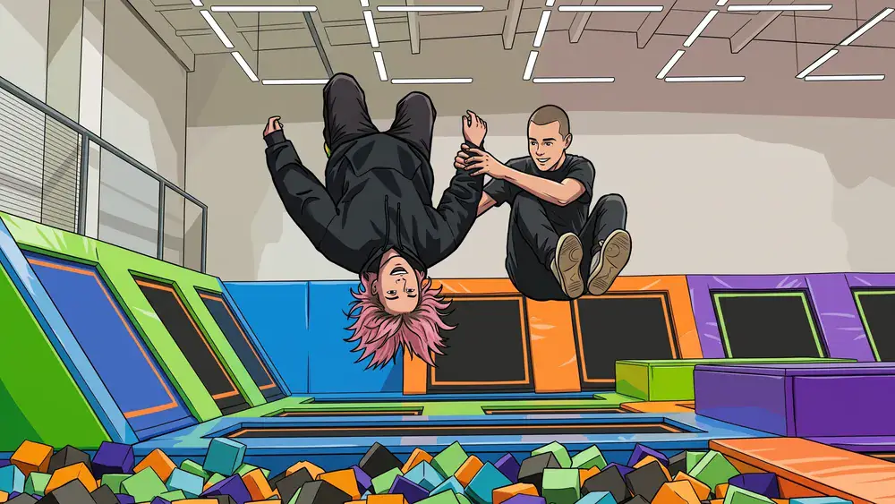 Superfly Trampolinpark in Düsseldorf – Zwei Personen springen auf Trampolinen