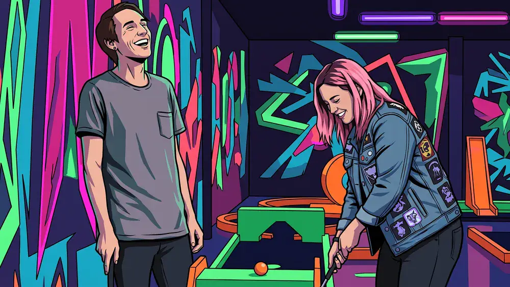 Schwarzlicht Minigolf in Hannover – Zwei Personen spielen Neon-Minigolf in bunter UV-Atmosphäre