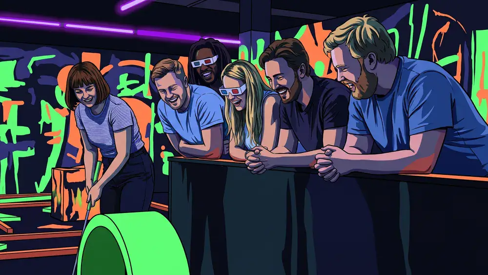 Schwarzlicht-Minigolf in Kassel – JGA-Gruppe spielt eine Bahn unter Neonfarben