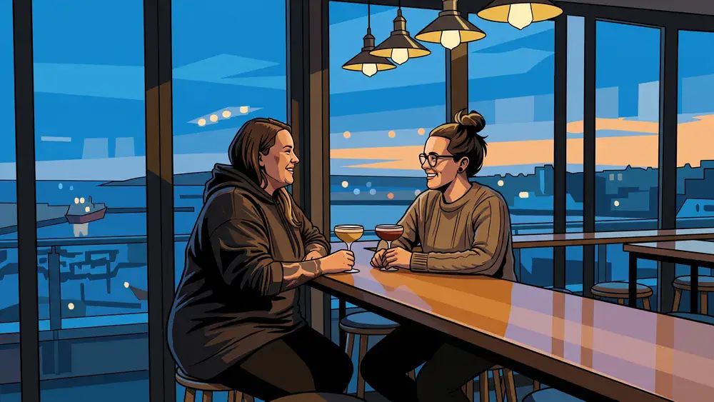 Deck 8 in Kiel – Team trinkt Cocktails an der Bar mit Panoramablick auf die Kieler Förde