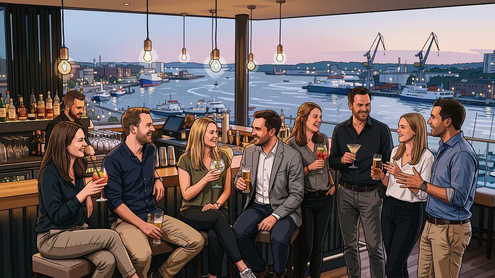 Deck 8 in Kiel – Kollegen trinken Cocktails an der Bar mit Panoramablick auf die Kieler Förde