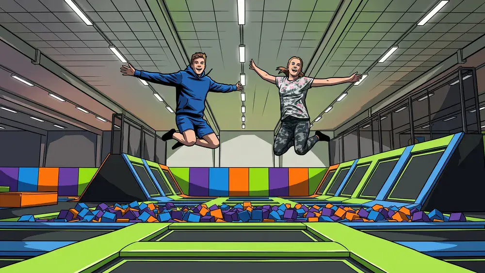 JUMP House Köln – Zwei Personen springen auf Trampolinen in einem bunten Indoor-Park