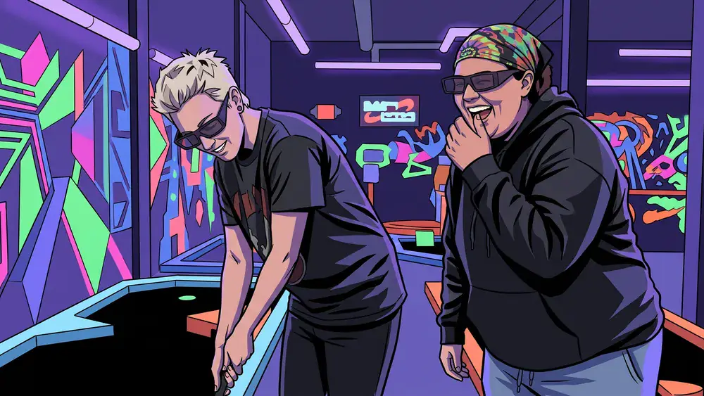 Blacklight Stuttgart – Zwei Personen spielen Schwarzlicht-Minigolf auf leuchtenden Neon-Bahnen