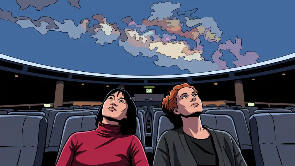 Planetarium Wien – Zwei Personen blicken in den Kuppelhimmel mit Sternenprojektion