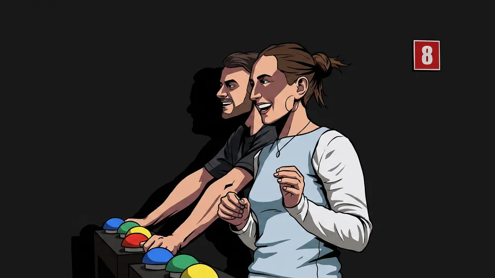 Gamer Gameshow in Berlin – Zwei Personen spielen gegeneinander an beleuchteten Spielstationen